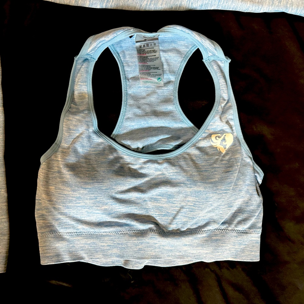 Women’s best sky, blue sports bra, removable padding size medium